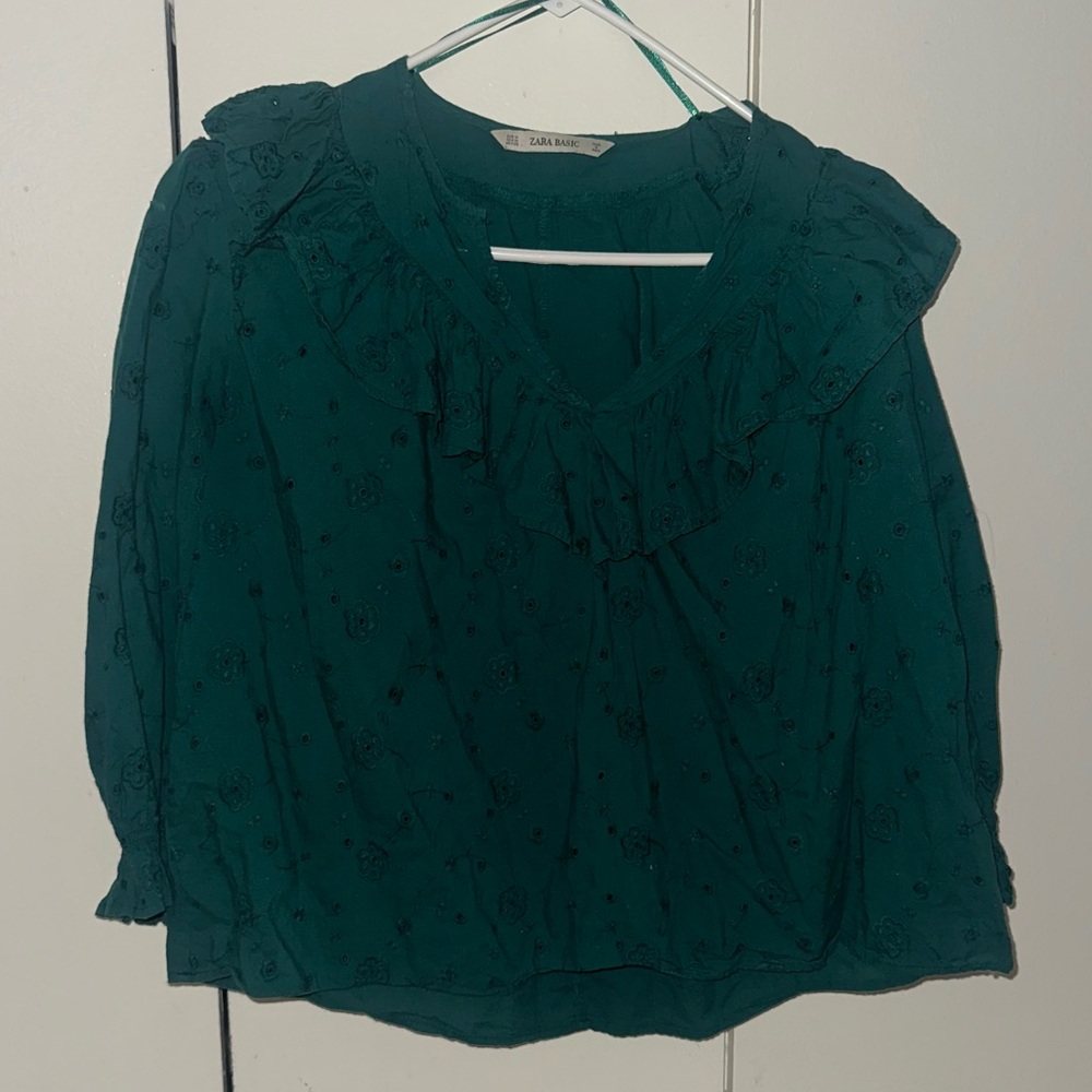 Green eyelet ruffle top